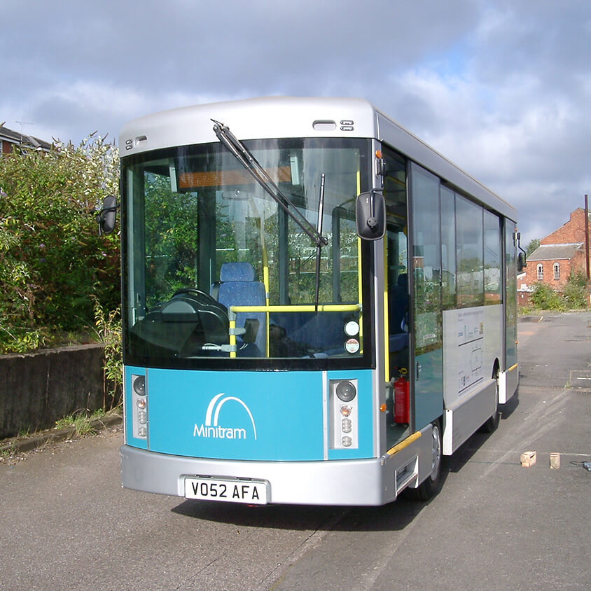 blue and silver electric bus on site